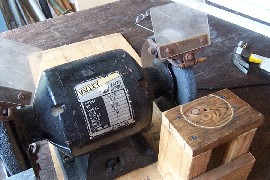 Bench Grinder and wooden grinding frame.